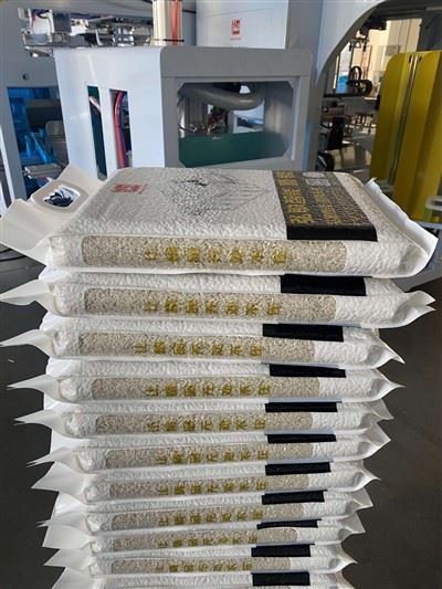 Finished rice bag from a dual-station vacuum packaging application